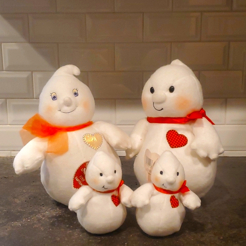 Vintage 1990s Hallmark ghost plushie family.